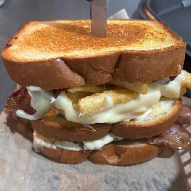Bacon Cheese Fry Grilled Cheese Sandwich.